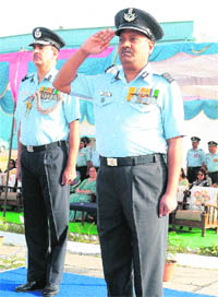 Group Capt Suresh Singh (right) takes over command of 3 BRD from Air Cmde R, Sharma (left) at a ceremonial parade in Chandigarh on Monday. 