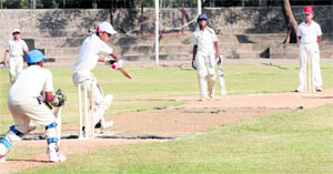 A batsman plays a shot during a match of the Hot Weather Tournament at Panchkula on Monday