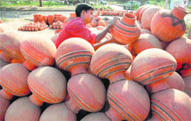 With summer in, prices of earthen pots are up in Chandigarh. 