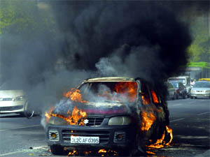 A Maurti car caught fire at Connaught Place in New Delhi on Monday.