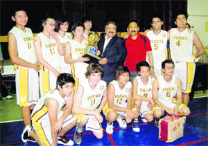 The Woodstock School, Mussoorie, team that won the All-India Jubilee Basketball Tournament held at Welham Boys' School, Dehradun, on Monday.