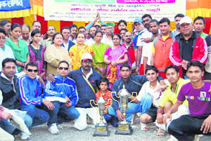 The Uttarakhand Police team with the trophy of the Anil Godiyal Memorial Cricket Tournament in Mussoorie.