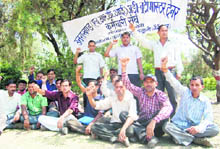 People from Tehri district stage a demonstration in front of the office of the Forest Department in Dehradun on Monday