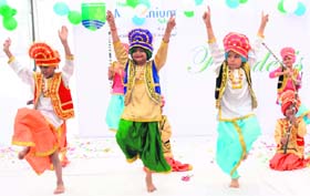 Schoolboys dancing to the beats of Punjabi music at a function in Karnal