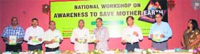 Officials releasing a magazine Paryavaran Sanjeevani during a workshop in Hisar