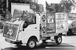 A CPM van moves in a street ahead of the third phase of the Assembly poll in Kolkata on Monday.