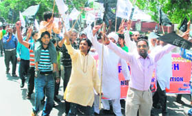 Members of the Chandigarh Meat Market Association take out a protest rally at Sector 22 in Chandigarh on Tuesday.