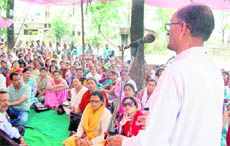 Junior high school teachers hold a protest in front of the Uttarakhand Assembly in Dehradun on Tuesday.