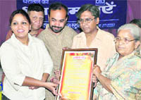 Dilraj Kaur is honoured at a function in Dehradun on Tuesday. 