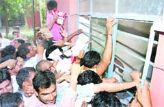 A stampede-like situation outside an HSDC outlet in Sirsa