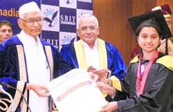 Haryana Governor Jagannath Pahadia presents a commendation certificate to a student during the convocation of the Shri Balwant Institute of Technology in Sonepat