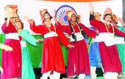 Students perform a dance during the annual function at Sainik School, Nagrota, on Tuesday