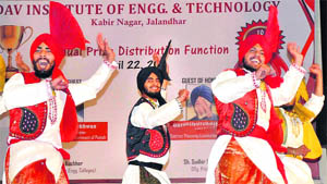 Students of DAVIET perform bhangra during the annual prize distribution function of the institute in Jalandhar.