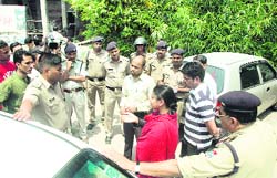 Sachin and his wife Nazia Yusuf argue with the police in Dehradun
