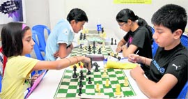 Participants of the All-India Open FIDE Rating Chess Tournament in action at St Xaviers Senior Secondary School, Sector 44, Chandigarh, on Thursday.