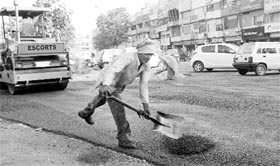 After much delay, work on relaying of roads in parking lots of Mohali has taken off. Tribune lensman Vicky Gharu captures the progress of work in a Phase 3B2 parking lot.