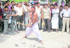 Artistes stage the play Strike at Sector 17 in Chandigarh on Thursday.