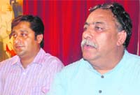 Harish Virmani, president of the Dehradun Mahanagar Congress, addresses a press conference in Dehradun