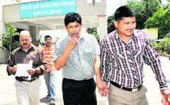 Arun Mishra, a former Chief Engineer of the Uttar Pradesh Industrial Development Corporation, is taken from Coronation Hospital by CBI sleuths in Dehradun