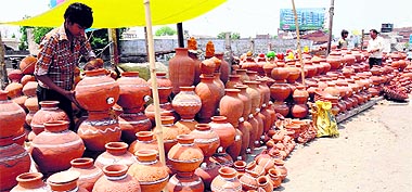 With the mercury soaring, sale of earthenware has gone up. A vendor has displayed a wide range of such products in Sector 14, Karnal.