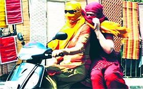 These women cover their faces to save themselves from heatwave in Gurgaon.