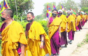 Long March: A march by Buddhist monks to draw the attention of the international community towards the plight of monks at the Kirti Jeypa Monastery in Tibet reached Nangal on Thursday. The march started on Wednesday and is bound for Delhi. Trouble at the monastery started on April 21 when two Tibetans were killed during Chinas crackdown on the monastery monks