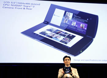 Kunimasa Suzuki, Deputy President of Sonys consumer products and services group, holds Sonys first tablet PC S2 at its unveiling ceremony in Tokyo, April 26, 2011.