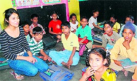 Pearl Jasra teaches needy children at her house in Amritsar.