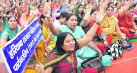 JBT teachers protest against the three-tier system introduced by the state government, at parade ground in Sector 5, Panchkula, on Friday.