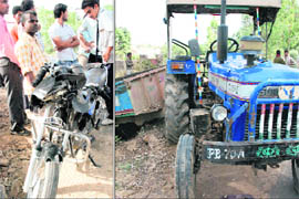 The motorcycle that hit a tractor-trailer (right) near Kadasan, Ambala, on Friday. One person was killed while four others were injured in the accident.