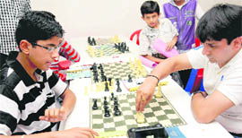 Players during the All-India Open Fide Rating Chess Tournament at St Xaviers Senior Secondary School, Sector 44-C, Chandigarh
