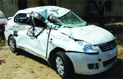 The mangled Swift car at a police station after the accident in New Delhi. 