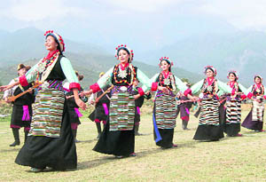 Artistes from the Tibetan Institute of Performing Arts (TIPA) present a Tibetan dance during the opening ceremony of the 23rd All-India Shaheed Durga Mal Dal Bahadur Memorial Gold Football Championship at Dharamsala on Friday. 