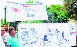 Activists of the PDP stage a protest in Jammu on Friday