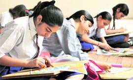 Students of KVM participate in a painting contest in Ludhiana on Friday.