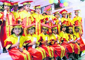 Children of Green Land Senior Secondary Public School during their graduation ceremony in Ludhiana on Friday.