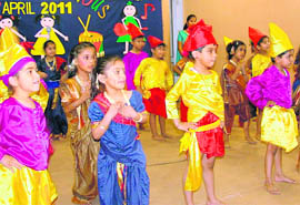 Students of Gian Jyoti Global School perform during an annual day function at Phase II, Mohali.  
