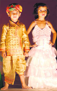 Children walk the ramp during Little champ kids fashion show organised by Chandigarh Art Theatre at Home Science College, Sector 10, Chandigarh, on Saturday. 
