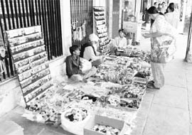 Vendors squatting in a corridor at the market of Sector 7 in Panchkula.