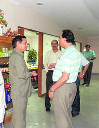 Industry Minister Kishan Kapoor during a raid at the Dabur unit in Baddi on Saturday.