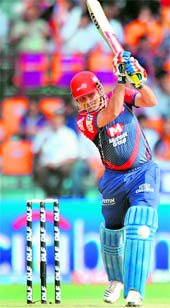 Virender Sehwag plays a shot during his knock of 80 in Kochi on Saturday