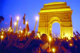 A candlelight procession held at India Gate to support the movement of Anna Hazare, India Against Corruption, in New Delhi on Sunday