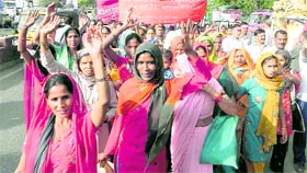 Women labourers holding a procession on May Day in Dehradun on Sunday. 