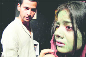 A scene from the Urdu play, 'Uska Ramu', directed by Neeraj Kant, which was staged at the Natrang Theatre in Jammu on Sunday.