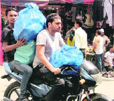 Despite a ban, plastic bags could be seen being used across Ludhiana on Sunday