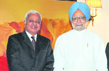 CII President B Muthuraman  along with Prime Minister Manmohan Singh at his residence on Monday.
