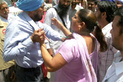 A mob manhandled the sub-divisional engineer, PWSSB, Hakam Singh in Abohar. 