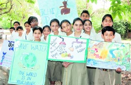 Students from the Saupins Community Service Organisation take out an awareness rally on Save Water in Chandigarh on Monday.