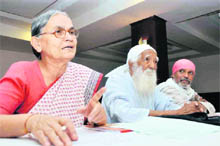 Gandhian Radha Behn, environmentalist Sunderlal Bahuguna and social activist Anil Joshi address a press conference in Dehradun on Monday.