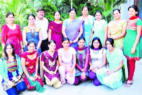A group photo of meritorious students of GVM Girls College with principal Dr Jyoti Arora and other teachers